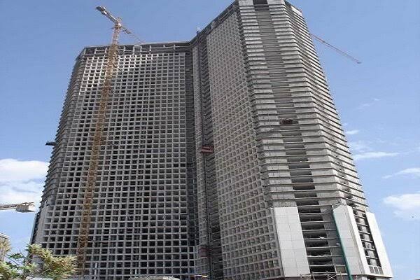 ساختمان بلندمرتبه در میان فضای سبز و طبیعت گیلان، نماد توسعه شهری و چالشهای حکمرانی مسئولانه